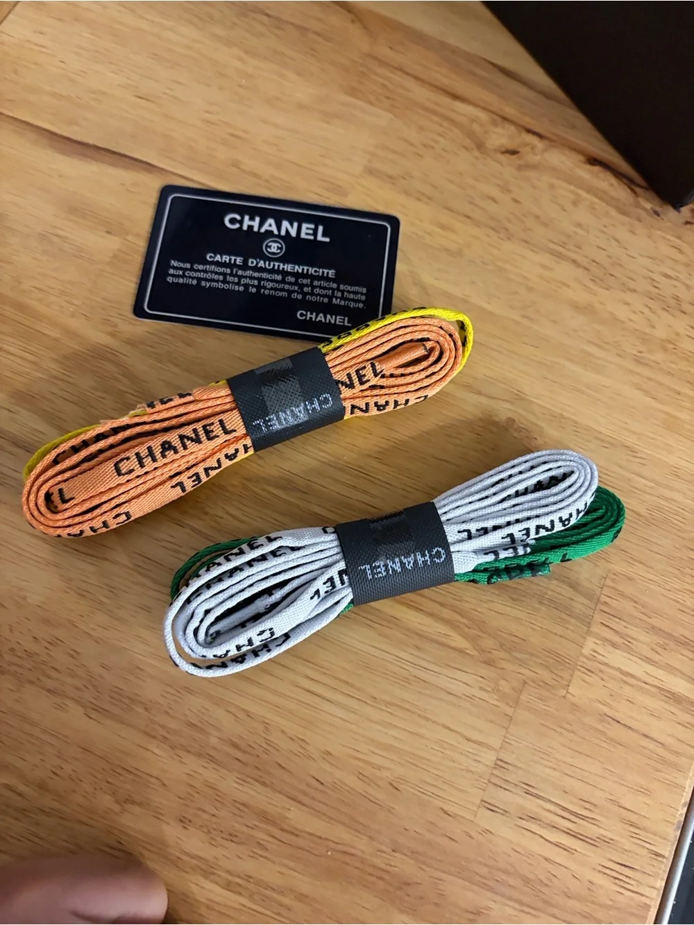 CHANEL White Kids Sneakers with Red and Navy Graphic Accents